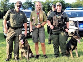(L-R)  K-9 Sgt. Lee Young, K-9 Eli, Eagle Scout candidate Taylor, K-9 Deputy Brad Harwell, K-9 Deputy Sarah Blair and K-9 Appie and Eli